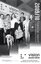 Group of people standing in front of Vision Australia sign with Seeing Eye Dog Max