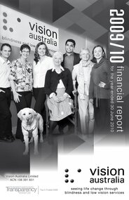 Group of people standing in front of Vision Australia sign with Seeing Eye Dog Max