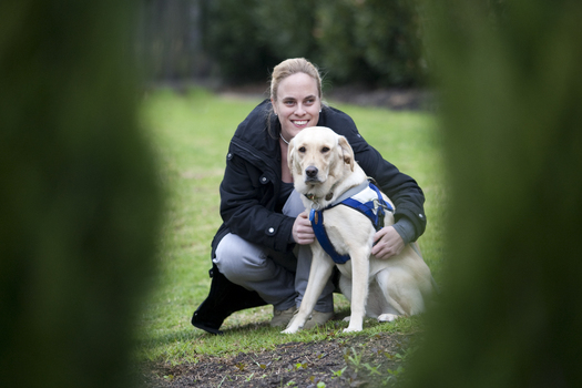 Penny Stevenson with her dog guide at Kooyong