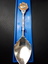 Silver plated spoon with Lady Nell Seeing Eye Dog School handle