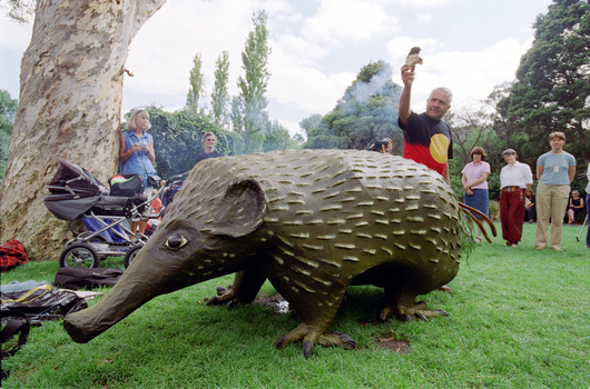 Welcome to Country ceremony with smoldering bark and Feelix echidna statue