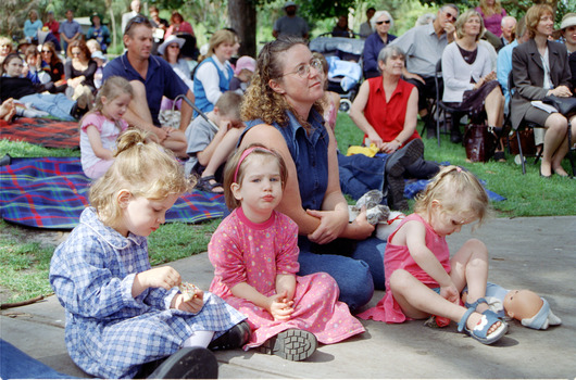 Families sitting on lawn watching official launch of Feelix in rotunda