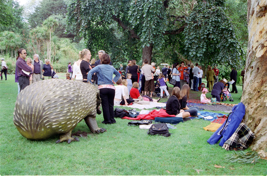Families sitting on lawn watching official launch of Feelix in rotunda