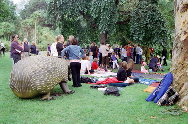 Families sitting on lawn watching official launch of Feelix in rotunda