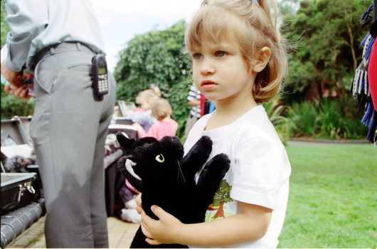 Children hold items from Feelix kits during the official launch at Melbourne Zoo
