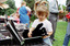 Children hold items from Feelix kits during the official launch at Melbourne Zoo