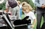 Children hold items from Feelix kits during the official launch at Melbourne Zoo