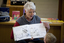 Louise Curtin reading the book to children