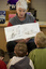 Louise Curtin reading the book to children