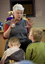Louise Curtin reading the book to children