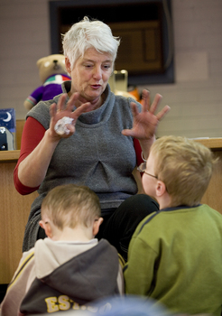 Louise Curtin reading the book to children