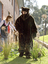 Bear (Ed Gamble) and the children on the Bear Hunt
