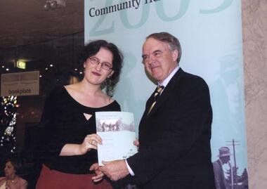 Anna Fairclough receives award from Rod Kemp