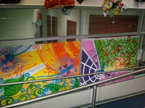 Coloured glass panes on side of lower walkway
