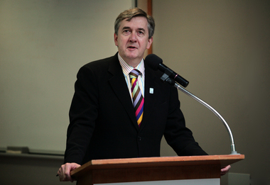 Gerard Menses at the podium for the 25th Anniversary of Vision Australia Radio
