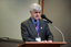 Stephen Jolley at the podium for the 25th Anniversary of Vision Australia Radio