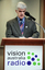 Stephen Jolley at the podium for the 25th Anniversary of Vision Australia Radio