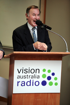Guest speaker Graeme Dawson at the podium for the 25th Anniversary of Vision Australia Radio