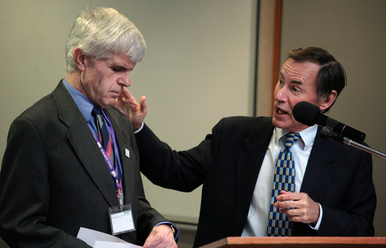 Stephen Jolley and guest speaker Graeme Dawson at the podium for the 25th Anniversary of Vision Australia Radio