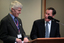 Stephen Jolley and guest speaker Graeme Dawson at the podium for the 25th Anniversary of Vision Australia Radio