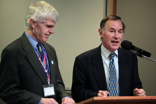 Stephen Jolley and guest speaker Graeme Dawson at the podium for the 25th Anniversary of Vision Australia Radio