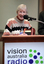 Pam Adams at the podium for the 25th Anniversary of Vision Australia Radio