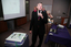 Gerard Menses and cake made for the 25th Anniversary of Vision Australia Radio