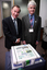 Guest speaker Graeme Dawson and Stephen Jolley with cake made for the 25th Anniversary of Vision Australia Radio