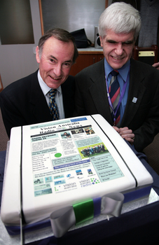 Guest speaker Graeme Dawson and Stephen Jolley with cake made for the 25th Anniversary of Vision Australia Radio