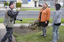 Photographer taking pictures of Jenny and Trudy outside Essendon office