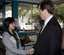 Jenny Tran shakes Bill Shorten's hand