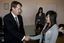 Handshake between Bill Shorten and Jenny Tran