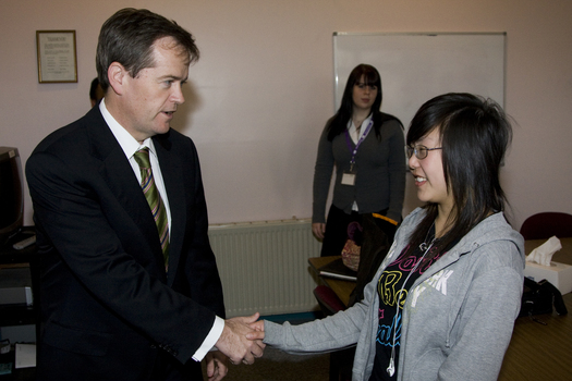 Handshake between Bill Shorten and Jenny Tran