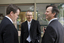 Bill Shorten speaking with Chris Edwards and unidentified man