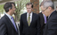 Bill Shorten speaking with Chris Edwards and unidentified man