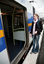Anna boarding the train with her cane