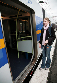 Anna boarding the train with her cane