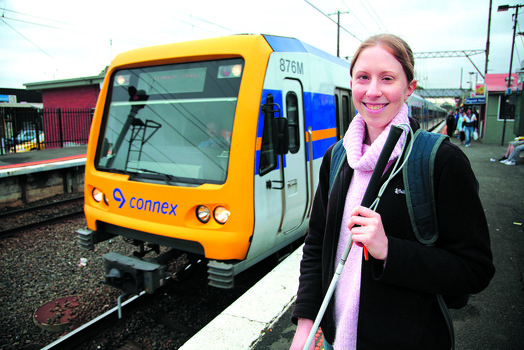 TIF image of Anna with train and white cane