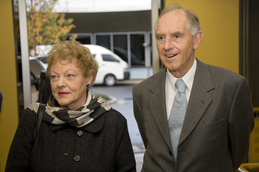 Nancye and John Cain stand in the Kooyong Reception area