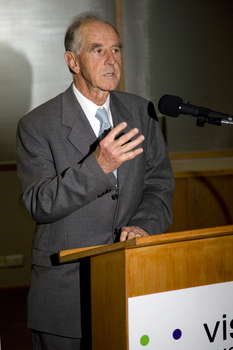 John Cain at the podium