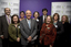 Nine people from the Victorian Library community face the camera