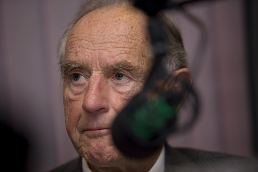 John Cain behind the microphone at Vision Australia Radio