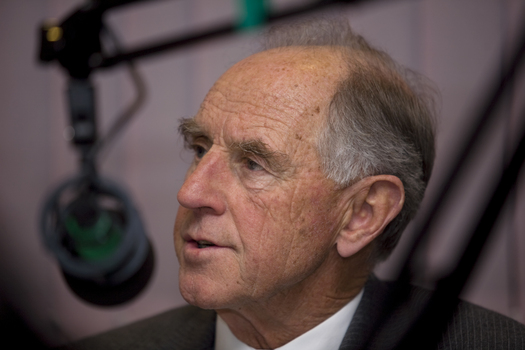 John Cain behind the microphone at Vision Australia Radio