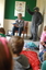 Adults, children and the Big Bad Wolf (aka Ed Gamble) listening to 'The Three Little Pigs'.