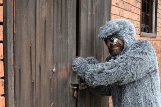 The Big Bad Wolf (aka Ed Gamble) tries to get into the house of bricks