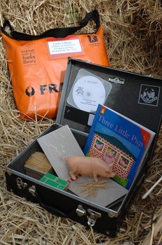 Feelix kit for 'The Three Little Pigs' with book, CD, tactile book and physical objects about the story