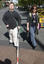 White cane users walking along river path at Southbank on a sunny day