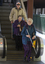 White cane user walking along the platform at Flinders Street Station