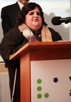 Maria Robinson speaking from the podium