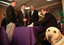 Jamie Kelly showing Daisy players to Gavin Jennings with Kevin Murfitt and Chris Edwards as Jamie's dog looks to camera